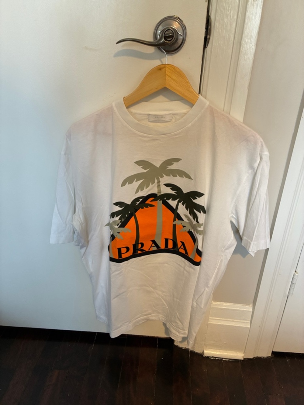 Prada White Tee with Orange Sunset and Green Palm Graphic